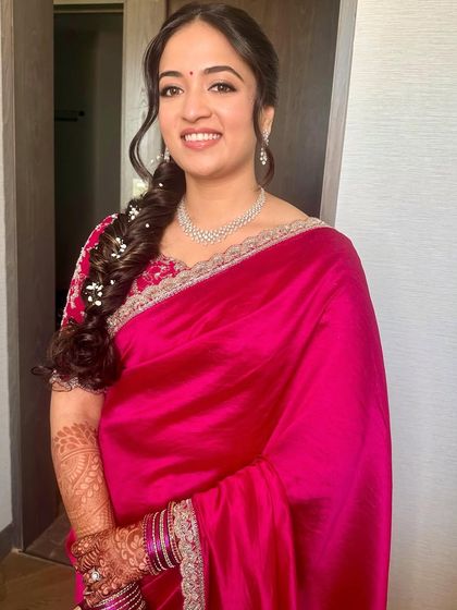 Another angle of this lovely pink saree look, perfect for a wedding guest or family member.