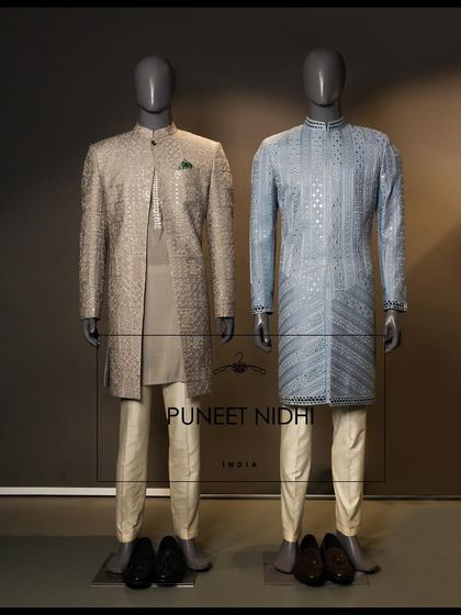 Step into the world of pastels with our breathtaking mirror work Achkans. This image showcases a beige and a powder blue option, both reflecting true craftsmanship.