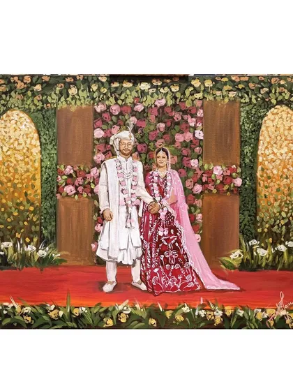 A finished live wedding painting from a beautiful celebration in Delhi. The floral wall provided a stunning, vibrant background for the couple's portrait.