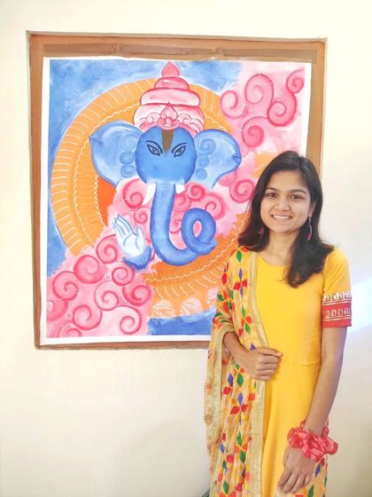 A softer, more whimsical take on Ganesha, with a pink and blue watercolor-style background. This piece was created to have a gentle and calming presence.