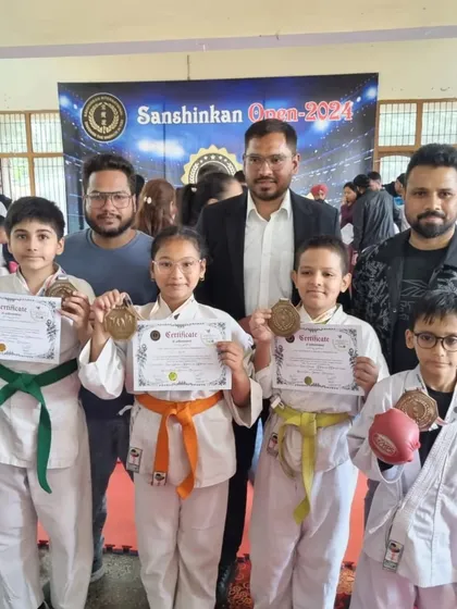Our students with their coaches after a successful haul at the Sanshinkan Open. We train as a team and we win as a team.