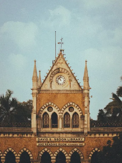 The beautiful facade of the David Sassoon Library and Reading Room, a historic landmark in Mumbai that exudes old-world charm.