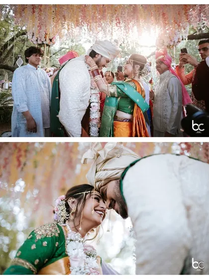 Two beautiful moments from a Marathi wedding: the varmala exchange under a floral canopy and an intimate, joyous forehead touch.