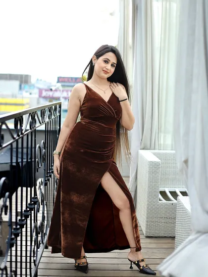 This portrait captures the influencer's look against the city skyline. It combines fashion with a sense of place, creating a compelling image for a Delhi-based influencer's feed.
