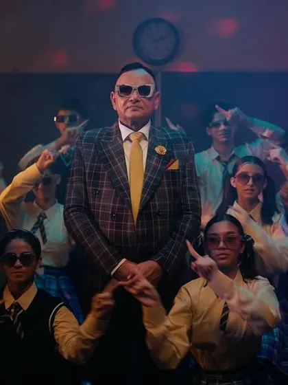 It was a blast styling the legendary mathematics author RD Sharma for this quirky Flipkart campaign. We created a fun, retro-inspired professor look with a classic plaid blazer and then switched to a cool, disco-themed group shot to match the ad's humorous tone.
