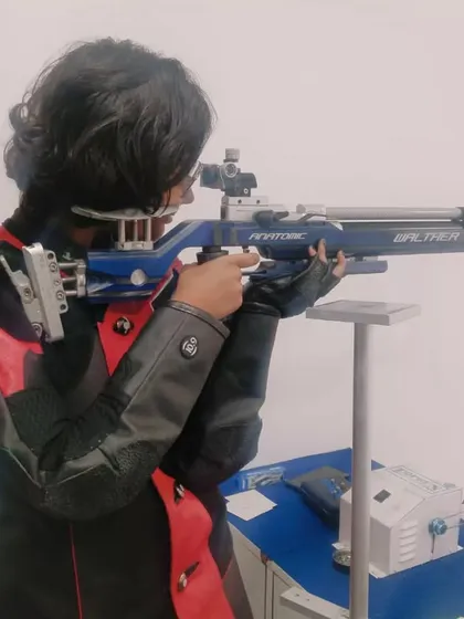 A young rifle shooter with her Walther Anatomic rifle during a training session at our Delhi branch.