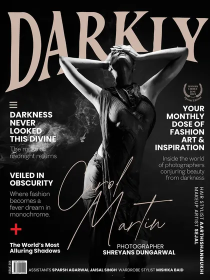 This black and white cover for Darkly Magazine captures a different mood. It's about sculpting with shadows and light to create a dramatic, statuesque form. This is where photography becomes a poetic interplay of shadow and form.