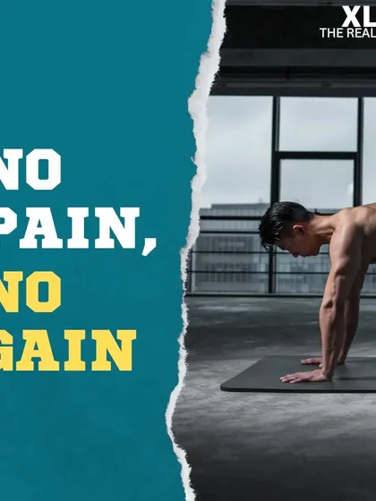 No Pain, No Gain. A classic fitness mantra paired with an image of a client working hard.