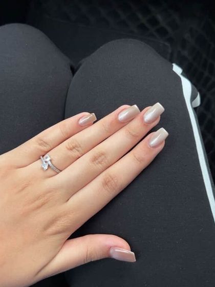 A casual shot of the nude cat eye nails, perfect for everyday wear.