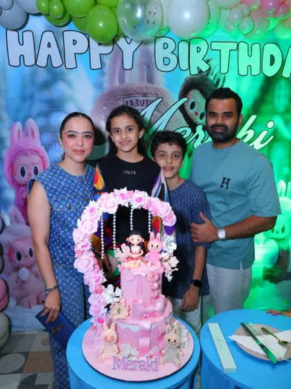 A lovely family portrait from the Labubu-themed celebration. Our party setups provide the perfect backdrop for capturing these precious memories.