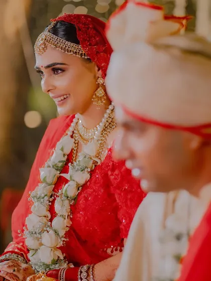 A candid moment from Aashna’s wedding ceremony. Her makeup was kept soft and romantic to match the intimate and joyous atmosphere.