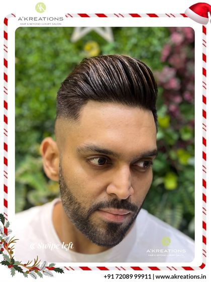 The details matter. This sharp fade is complemented by a clean beard lineup, creating a polished and cohesive grooming style.