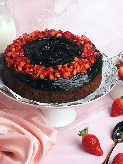 Savor the season with my special Strawberry Ganache Cake. It's a sweet celebration of fresh strawberries in every single bite.