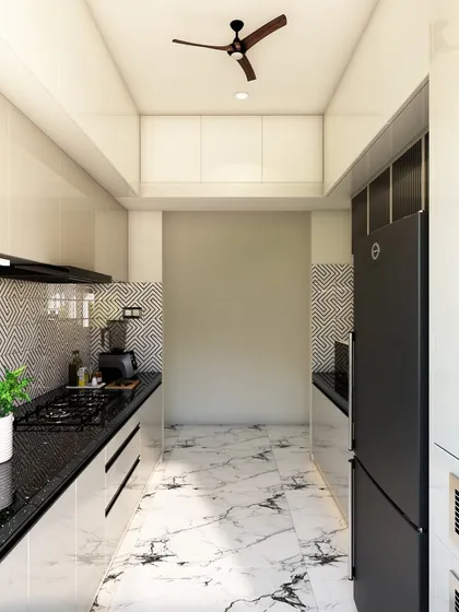 A modern galley kitchen with a black and white theme, featuring a striking geometric backsplash, glossy white cabinets, and black granite countertops.
