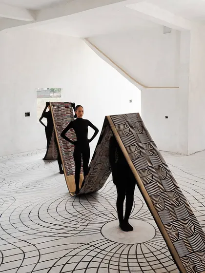 This shot from 'The Line' series for Shanti Banaras shows my conceptual approach to styling. We used models in minimalist catsuits to interact with textile installations, turning the fabric itself into a sculptural and architectural element of the story.