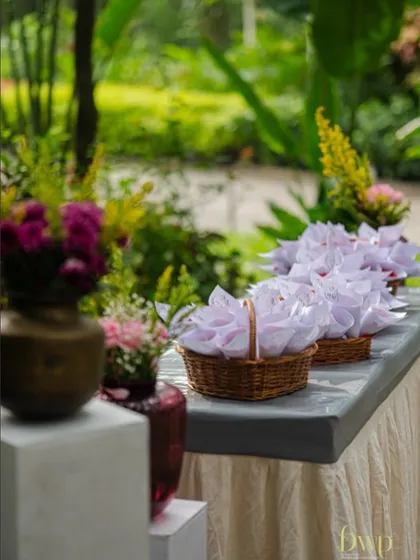 Baskets of fresh petals ready for guests to shower the couple with blessings. It's these small, interactive details that make a wedding feel inclusive and celebratory.