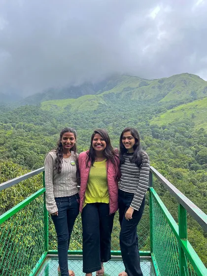 A group of friends at a viewpoint in Wayanad.