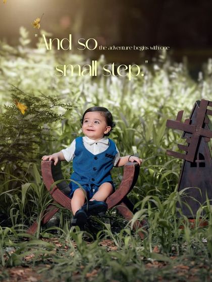 The adventure begins with one small step. A beautiful outdoor first birthday portrait with rustic props and a sense of wonder.