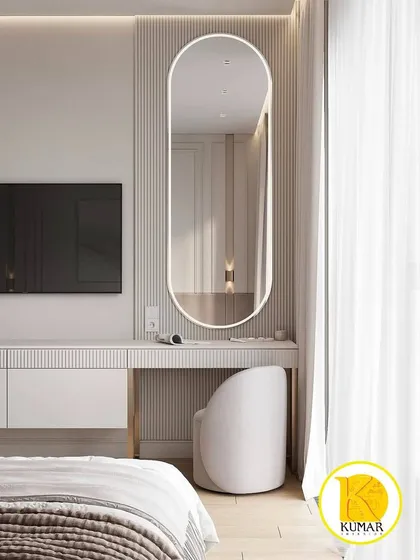 Another view of the chic dressing table, showing its placement next to the window for ample natural light.