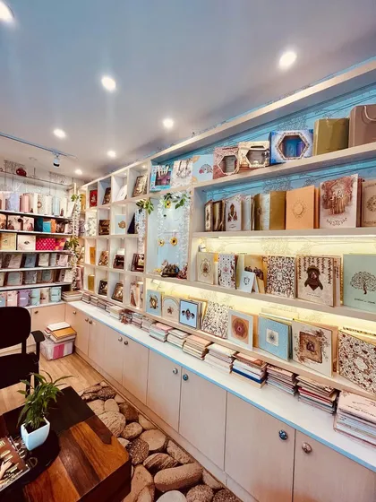 A glimpse into my Koramangala store, where you can see hundreds of designer card options displayed. I believe in letting you see and feel the quality of the paper and printing for yourself.