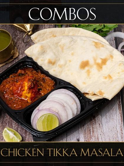 Our Chicken Tikka Masala combo meal. This popular dish features grilled chicken tikka pieces simmered in a rich, creamy, and spiced tomato gravy, served with fresh naan.