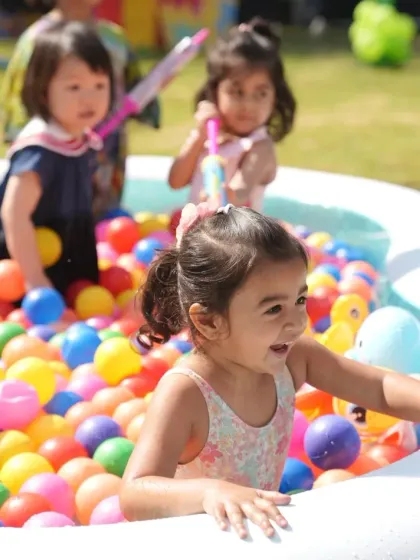 Our inflatable ball pits bring the fun of a play zone to your backyard. This setup at a kids' pool party provided a safe and colorful area for young children to splash and play.