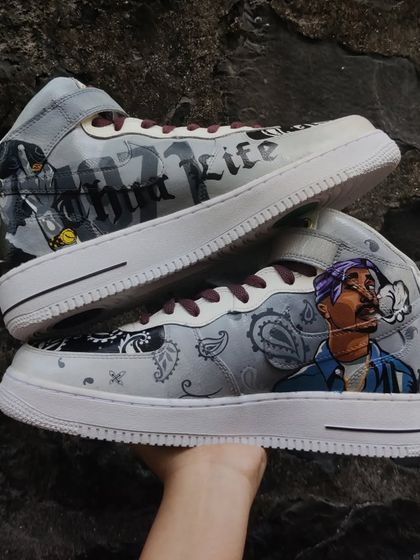 This Tupac-themed Air Force 1 Mid has a special place in my heart. It was a real challenge, and I pushed through a mental block to do justice to the legend. The design features portraits of 2pac, bandana prints, and "Thug Life" calligraphy.