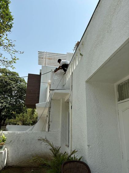 A wide shot showing the scale of an exterior installation on a multi-story home. We ensure complete perimeter coverage from all angles.