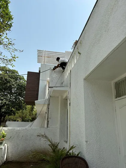 A wide shot showing the scale of an exterior installation on a multi-story home. We ensure complete perimeter coverage from all angles.