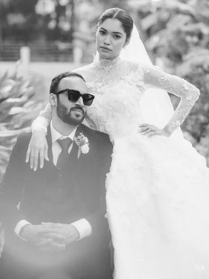 The groom, cool and composed; the bride, a vision of grace. This black and white portrait showcases our editorial approach, creating stylish, powerful images that have a timeless, magazine-worthy quality.
