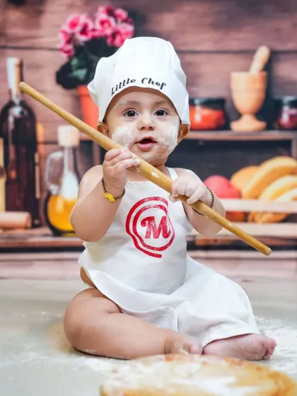 Let's get creative! The 'Little Chef' theme is perfect for capturing a baby's playful and curious nature. With a bit of flour and a lot of fun, we create adorable and memorable portraits.