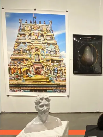 A highlight from a past edition of the Seattle Art Fair, featuring a large photograph and a sculpture.