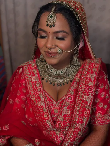 A close-up of the bride's makeup, showing the soft smokey eye and flawless skin.