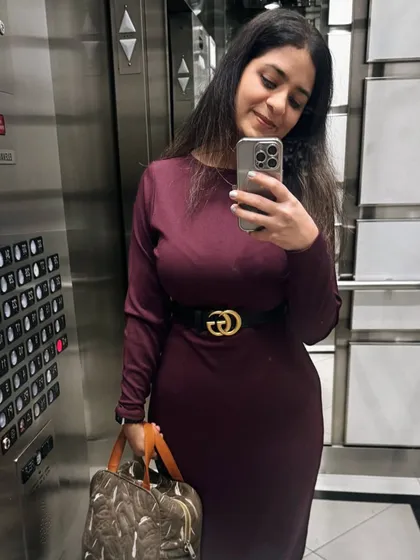 A happy client showcasing her targeted fat loss results. Our sports nutrition approach focuses on building lean muscle mass for a toned and strong physique.