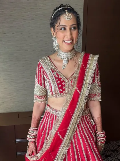 The pure joy of a bride on her wedding day. Her makeup is fresh and radiant, designed to last through the ceremony while feeling light and comfortable.