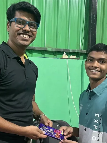 Sharing a moment with one of our players during the anniversary celebration. These relationships are what make our academy a true family.
