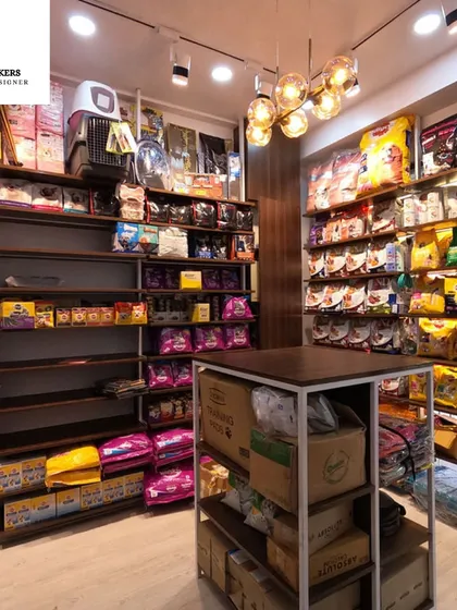 This view of the pet store interior showcases my approach to store layout optimization. The shelving and central island are designed to maximize product visibility and encourage a natural flow for customers, making browsing easy and intuitive.