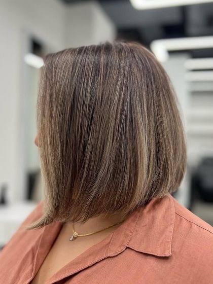 Another angle of this beautiful bob. The cut is precise, and the color adds just the right amount of dimension.