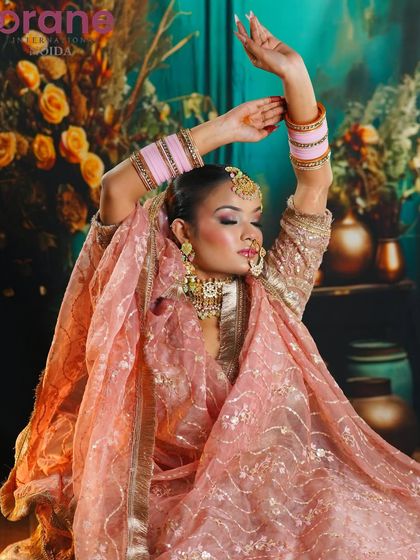 An elegant Eid-inspired look with a soft pink color palette, showcasing skills in creating festive and culturally specific makeup.