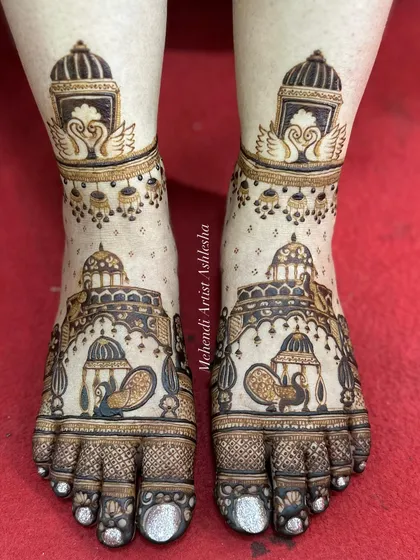 Another view of the royal bridal feet design, showing the intricate details of the palanquins and swans. The craftsmanship is evident in every line.