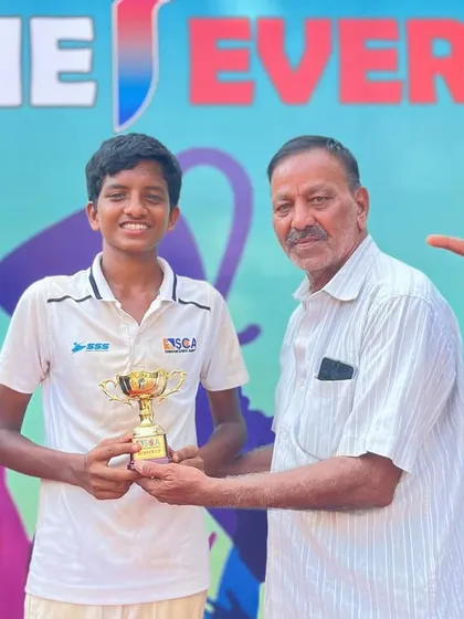 A proud moment for a young player receiving his individual award.