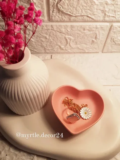 A gift set idea featuring our oval cloud tray, mini heart dish, and ribbed vase. The neutral white and soft pink tones create a gentle, calming aesthetic.