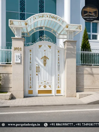 A truly grand entrance featuring an ornate white and gold gate topped with a custom glass canopy. This is a prime example of our luxury fabrication capabilities, creating a regal first impression.
