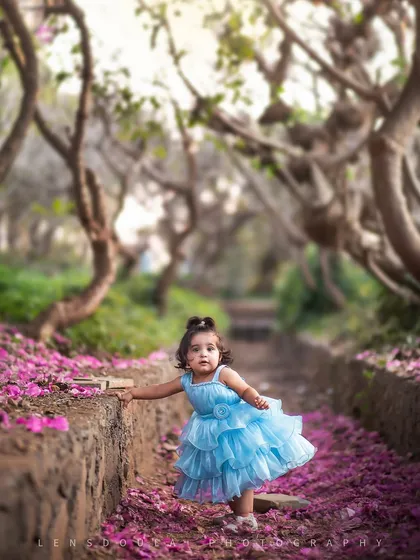 A little princess in her own secret garden. We found this beautiful trail of flowers and knew it was the perfect spot for a magical outdoor portrait.