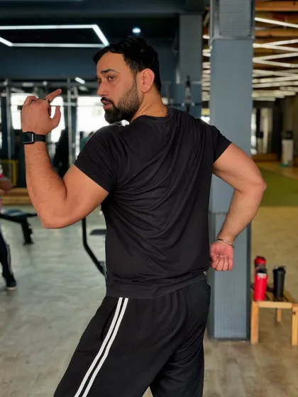 Posing to check my progress. Every workout is a step towards the physique I envision for myself.