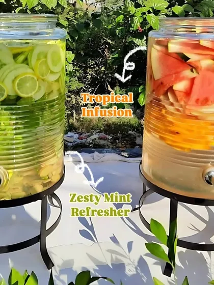 My infused water station offers a healthy and refreshing hydration option. This image shows two large glass dispensers, one with a Zesty Mint Refresher and the other with a Tropical Infusion of watermelon and orange.