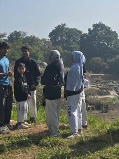 Taking a moment to regroup during our outdoor session at Lal Bagh. Training in new environments keeps us sharp and adaptable.