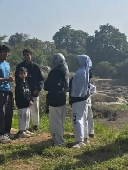 A moment of instruction and discussion during our Lal Bagh training session.