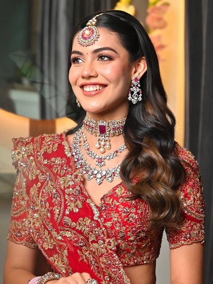 Her smile says it all. This look is a perfect balance of tradition and glam, making her feel confident and radiant.