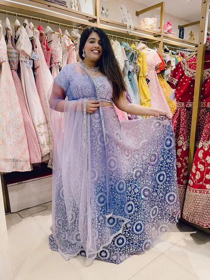 Trying on a beautiful ombre purple and blue lehenga. My store is a playground of colors and styles for you to explore.